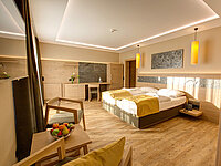 AIGO Familienhotel | Hotelzimmer Doppelbett