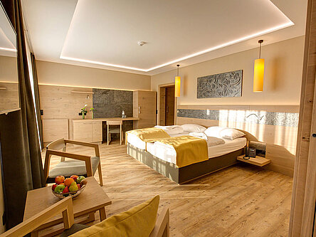AIGO Familienhotel | Hotelzimmer Doppelbett